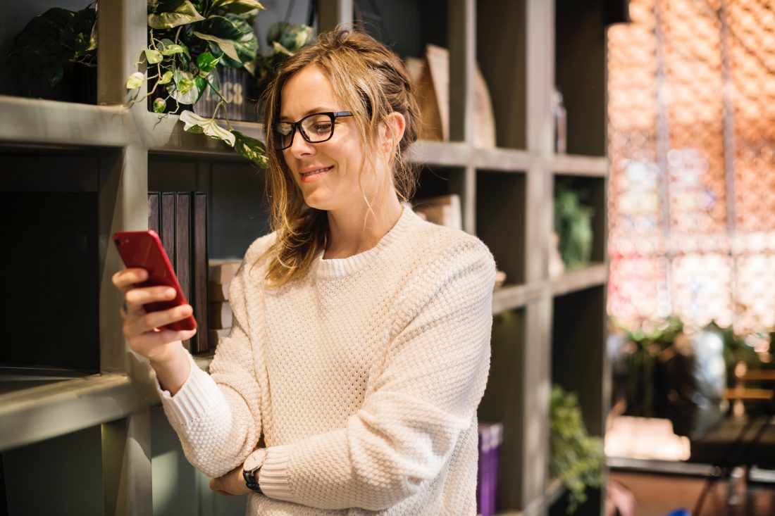 a woman ordering food from a food app