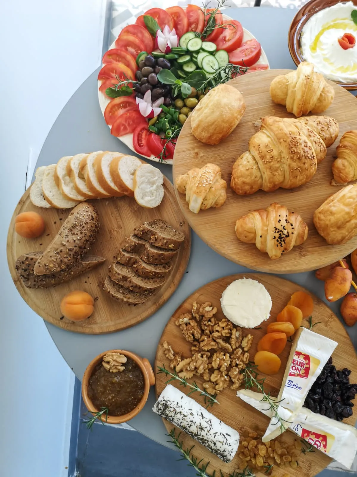 Charcuterie boards and baked croissants and pastries 