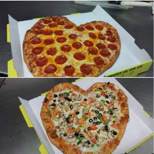 Heart shaped Valentine's Day pizza 