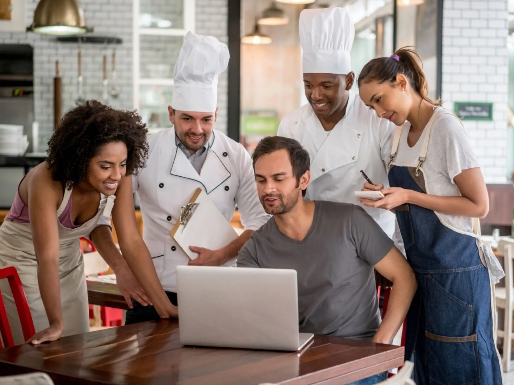 A meeting with a restaurant manager and his staff