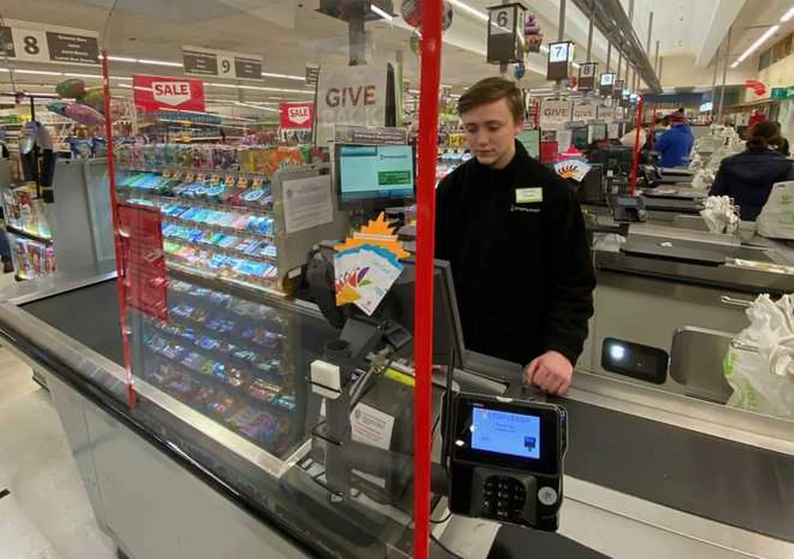 An employee working in a supermarket