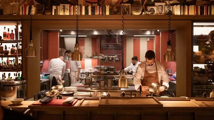 Employees working in a restaurant kitchen