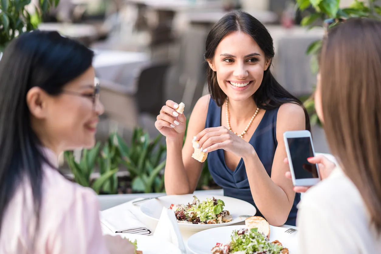 customers enjoying their food at a restaurant