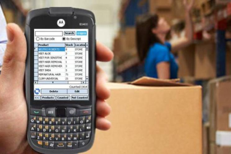 an employee checking inventory to identify purchases needed