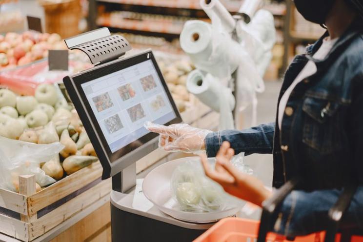 an employee checking her inventory on the POS software