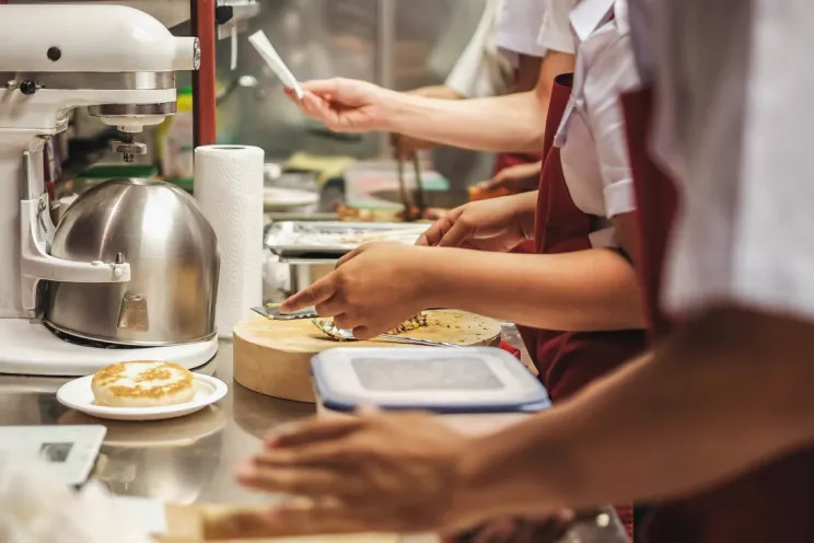 chefs working in a restaurant