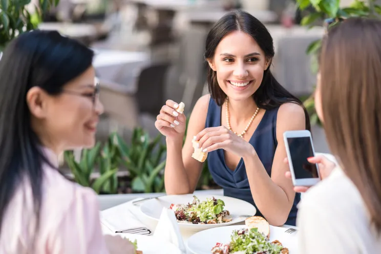customers enjoying their food at a restaurant