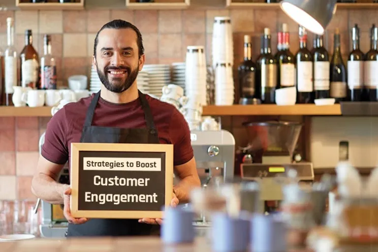 Increase restaurant customer engagement: a bartender holding a sign
