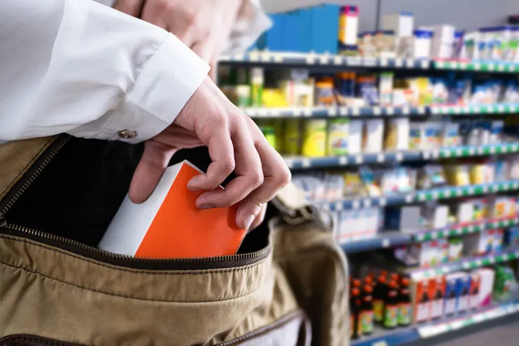 a customer shoplifting from the supermarket