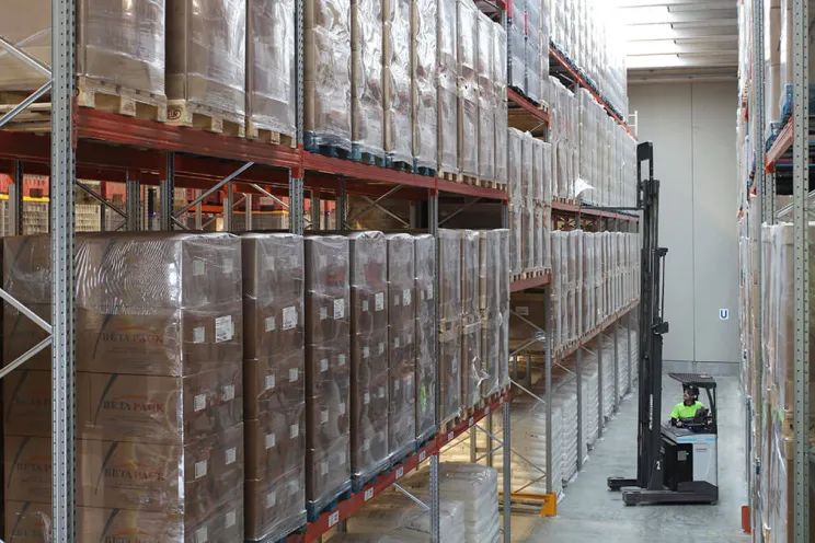A picture of a warehouse full of sttock in a supermarket
