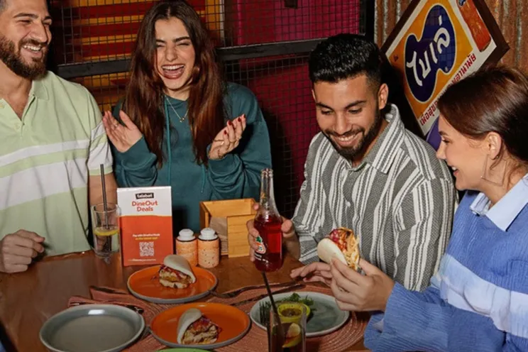 customers enjoying their food at a restaurant