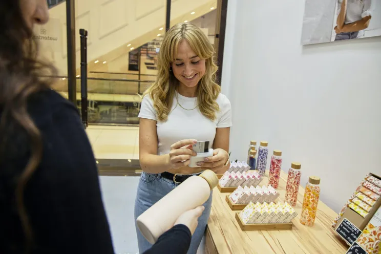 a customer paying at a store
